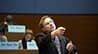Toby Moskowitz pointing in a classroom